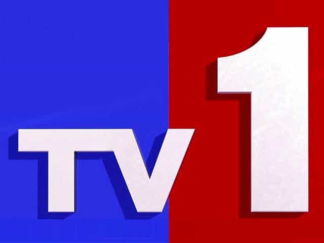 The logo of TV1 Telugu