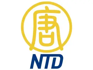 The logo of NTD TV China