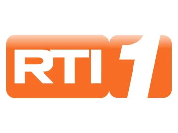 The logo of RTI 1
